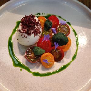 Burrata, with Isle of Wight tomatoes, black olive and basil.