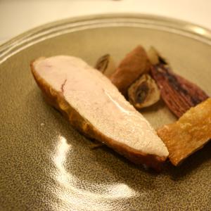 Roast corn fed chicken (breast and piard of leg) with roast onions.