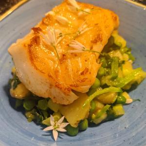 Cornish day boat cod with English legumes, Jersey Royal potatoes and wild garlic
