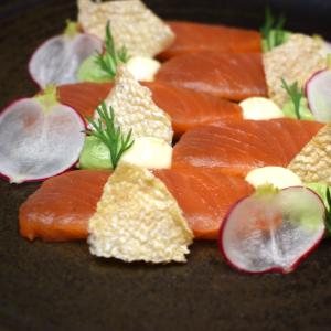 Cured sea trout with avocado, lime mayonnaise, radish and dill.
